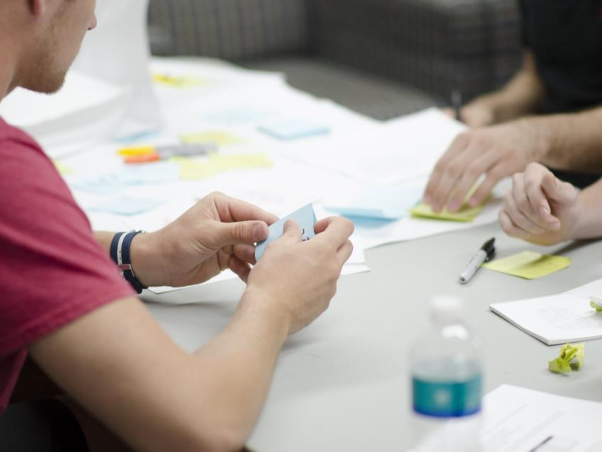 An agency account lead adding strategy notes to an AI-drafted monthly client report